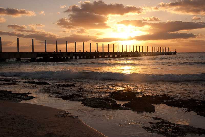 playa-del-carmen-a-beautiful-sunrise-over-the-pier-on-the-caribbean-sea