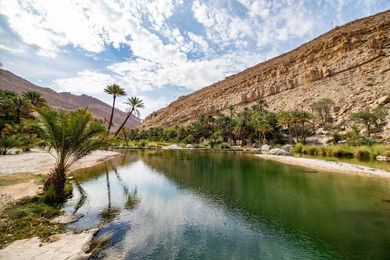 Palms in Wadi Bani Khalid with lake near Bidiyya in Oman © Stefan Hochreutener Dreamstime.com_