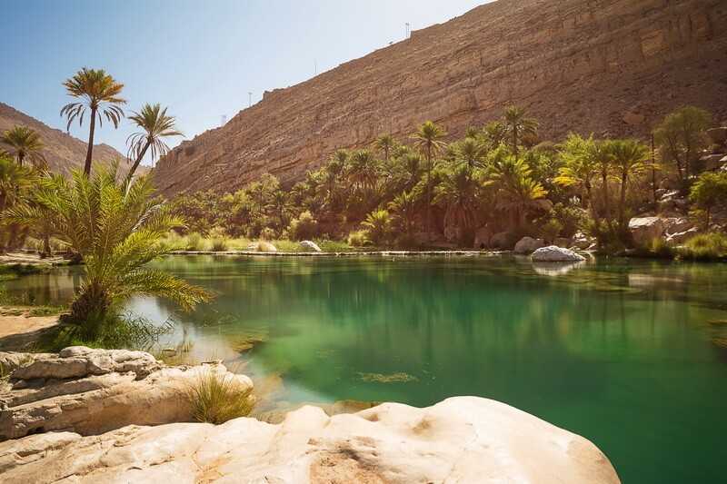 Amazing Lake and oasis with palm trees Wadi Bani Khalid in the Omani desert © Adamico  Dreamstime.com_