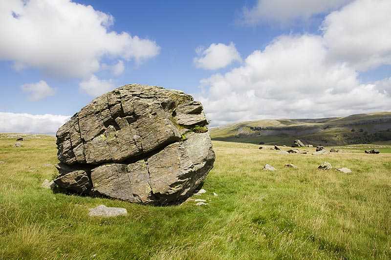 norber-erratics-silurian-sandstone-boulders-stand-atop-younger-limestone-on-the-open-hillside-above
