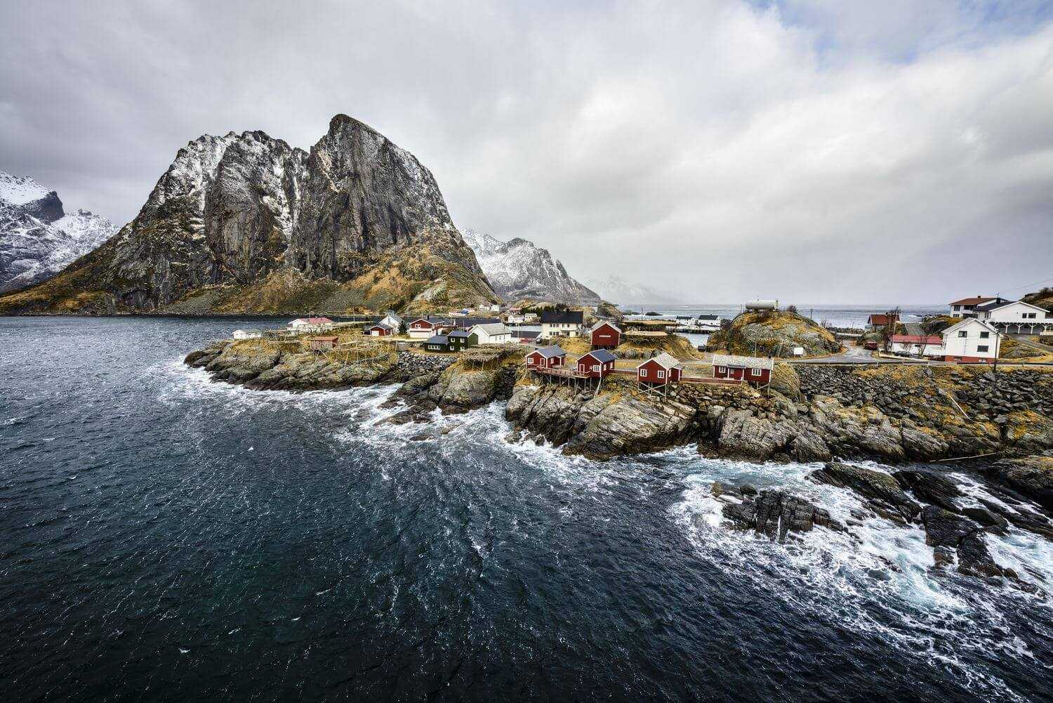 54905-snowy-mountains-overlooking-rocky-coastline-2023-11-27-05-05-59-utc_0