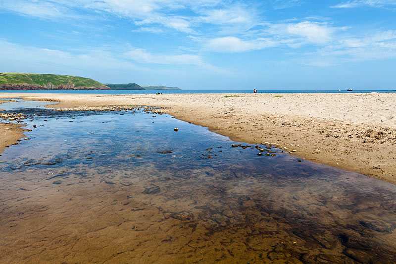 freshwater-east-beach-reflections-on-the-water-at-freshwate-east-beach-pembrokeshire-wales
