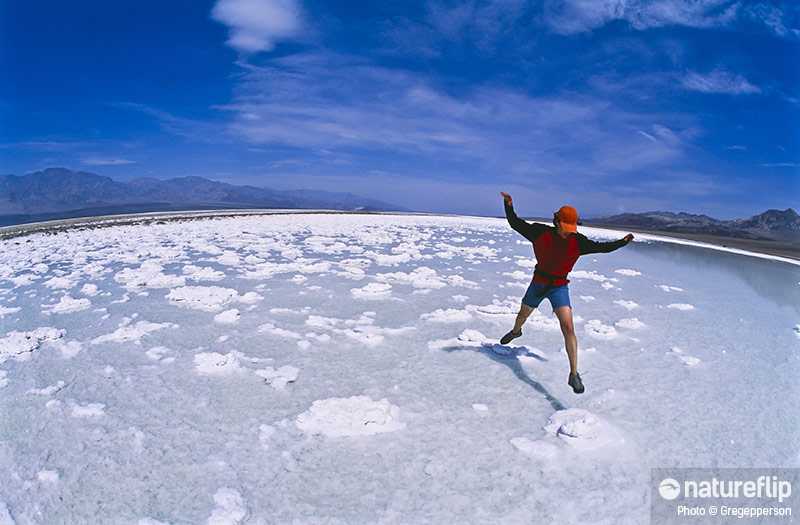 Jumping Acroos the Salt Pans in Death Valley National Park