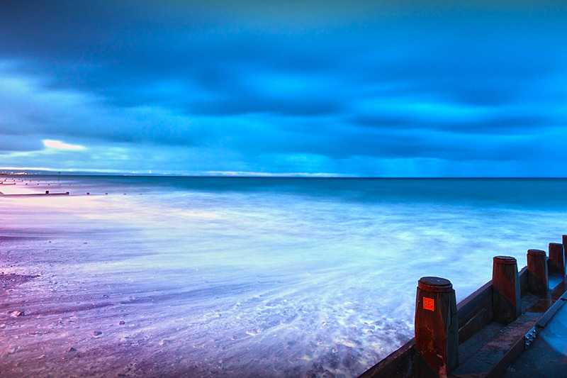 tywyn-beach-moonlight-and-street-lights-provide-contrasting-colors-here-in-this-beautiful-beach