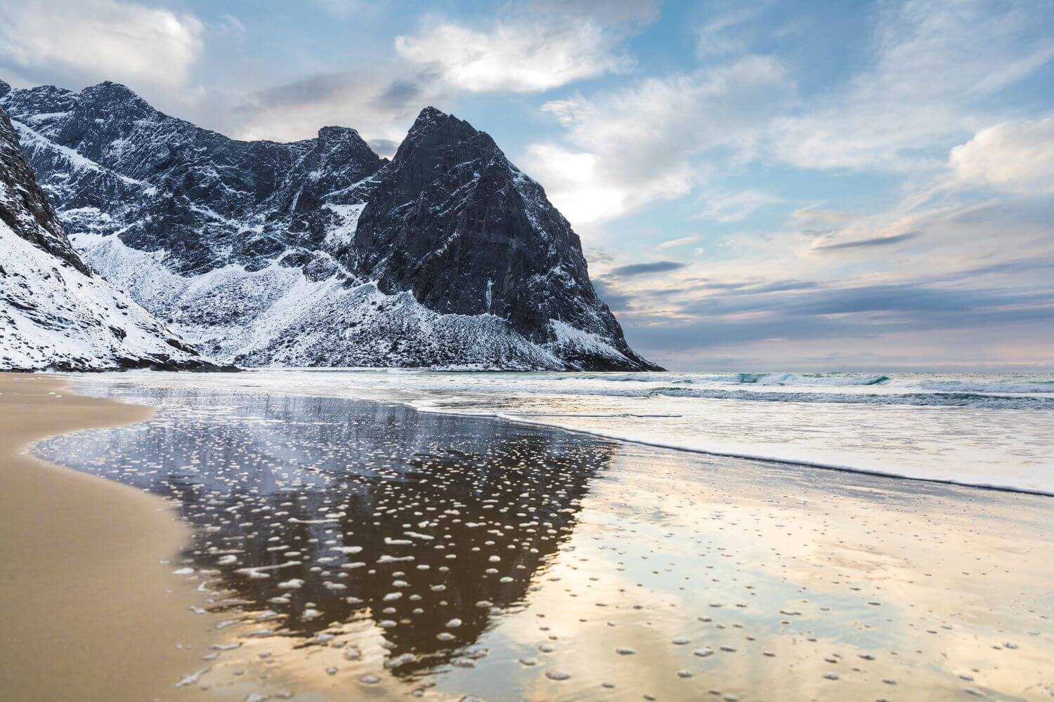 landscape-of-the-kvalvika-beach-surrounded-by-rock-2023-11-27-05-35-18-utc